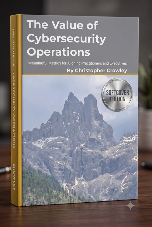 A book titled "The Value of Cybersecurity Operations" by Christopher Crowley, shown standing upright on a wooden surface with a blurred indoor background. The cover features a mountain landscape photo, a gray title band, and a gold spine.